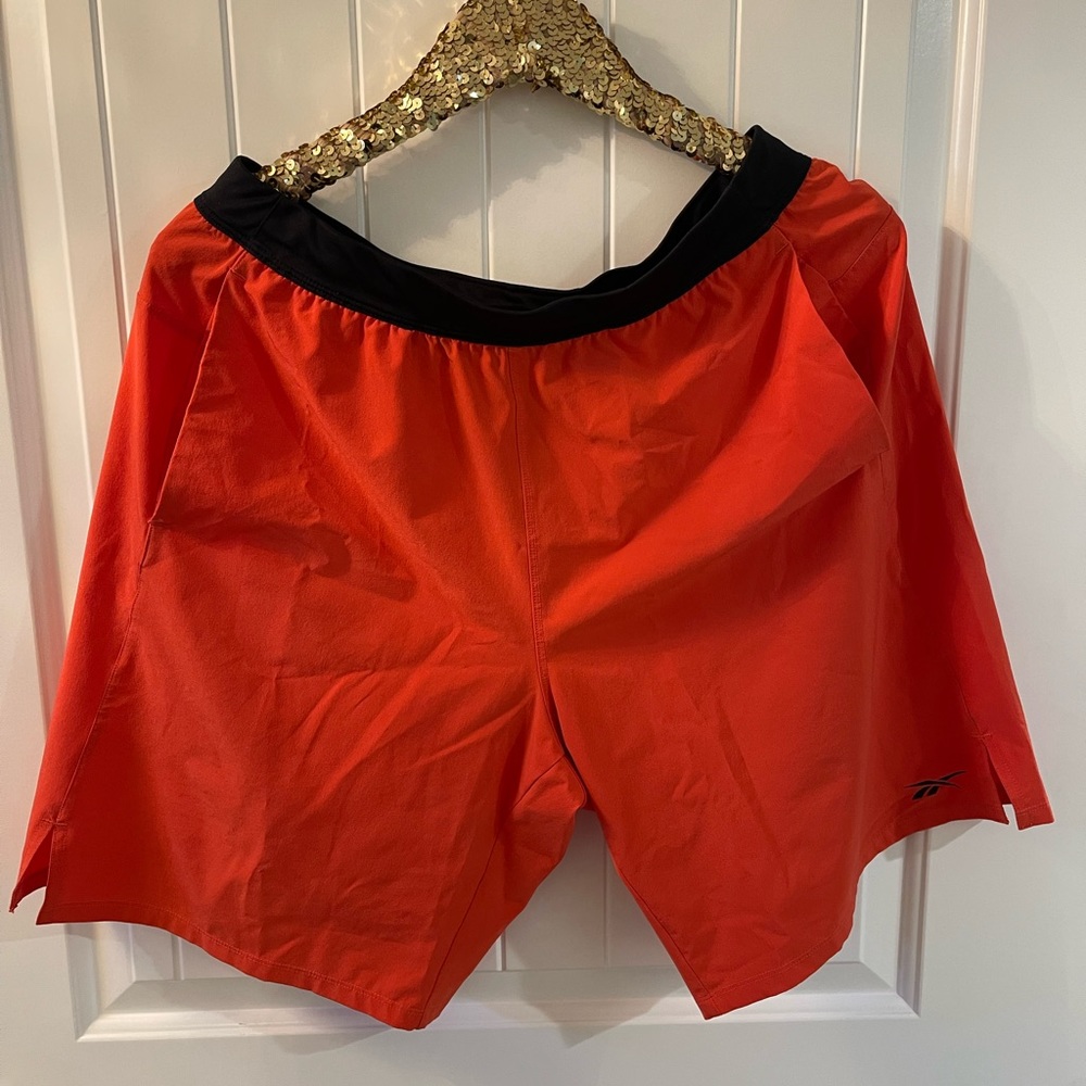 Reebok men’s large orange workout shorts